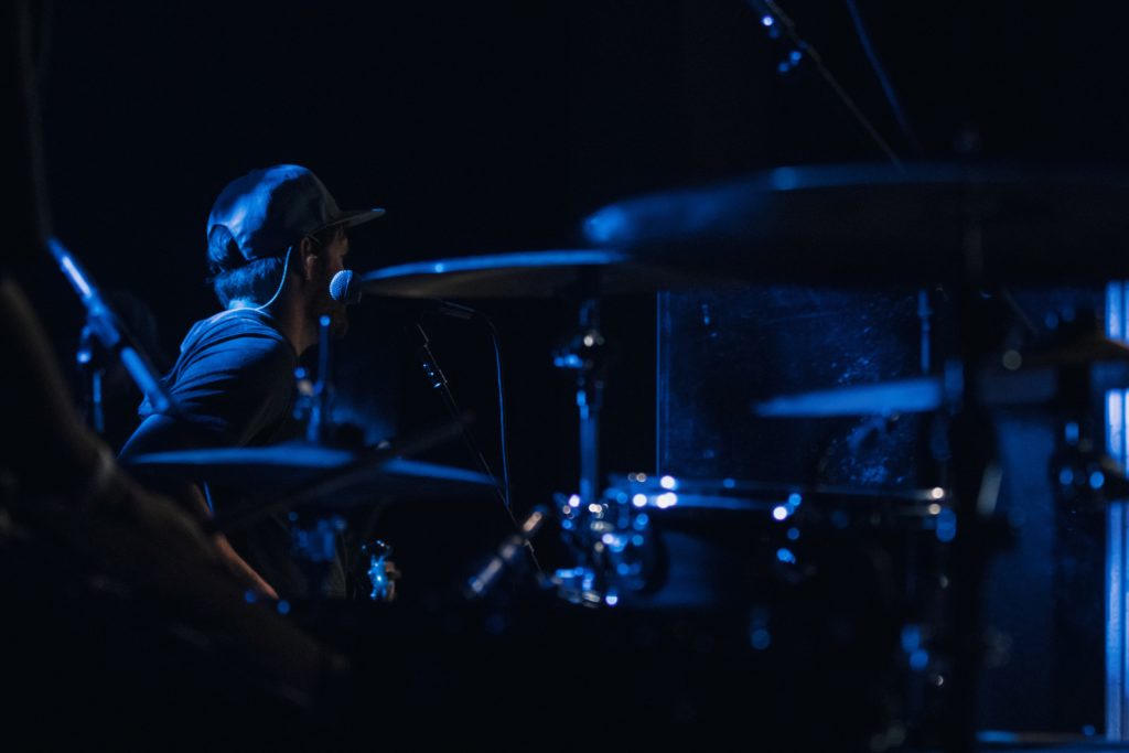 man playing drum